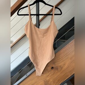 Lovers and friends tan bodysuit